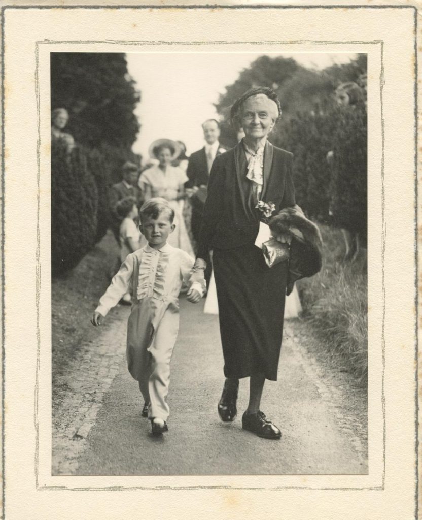 Black and white photograph of Ethel (Poppy) Clarke, with young boy.