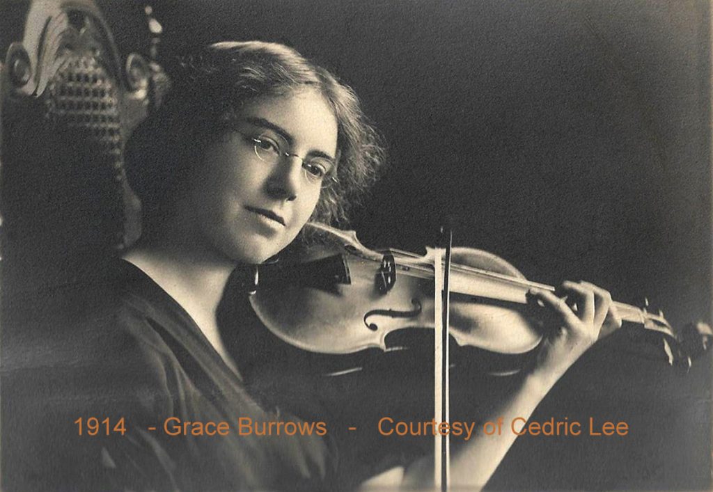 Black and white photograph of Grace Burrows playing violin.