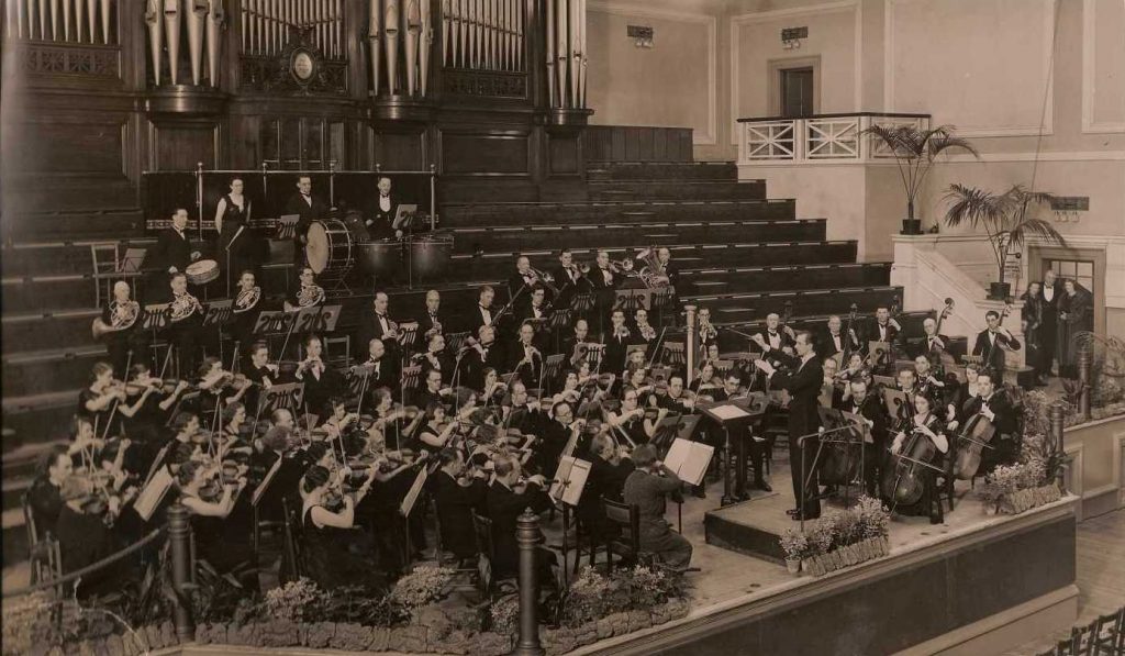 Black and white photograph of Malcolm Sargent conducting the Leicester Symphony Orchestra, courtesy Leicester Symphony Orchestra.