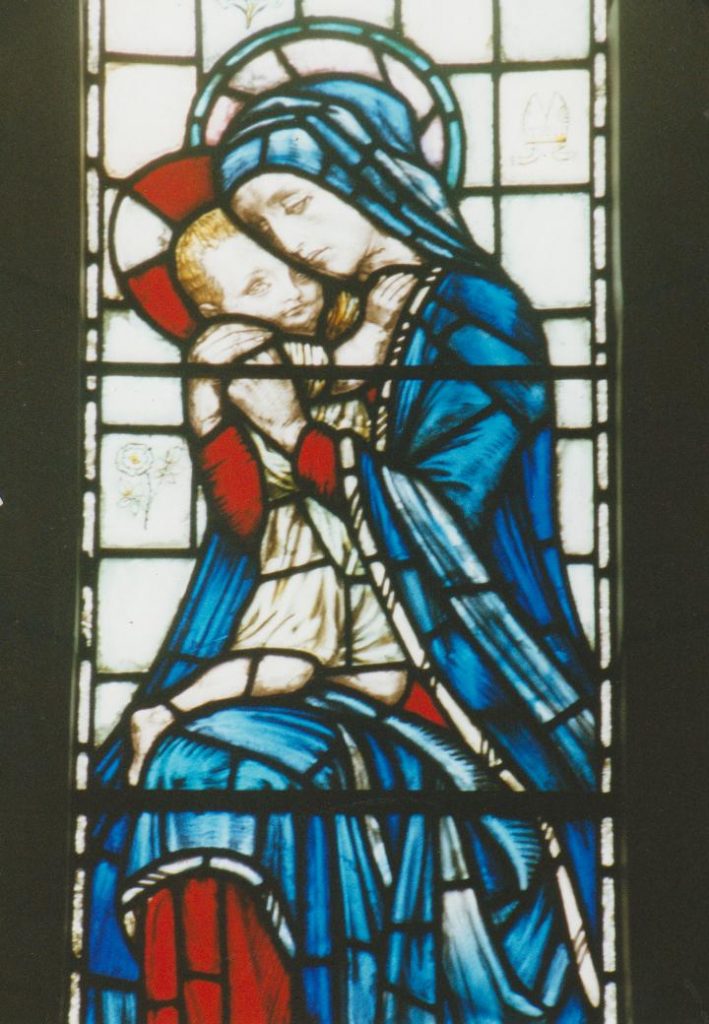 Photograph of stained glass window in St James the Greater church in memory of Augustine Gee